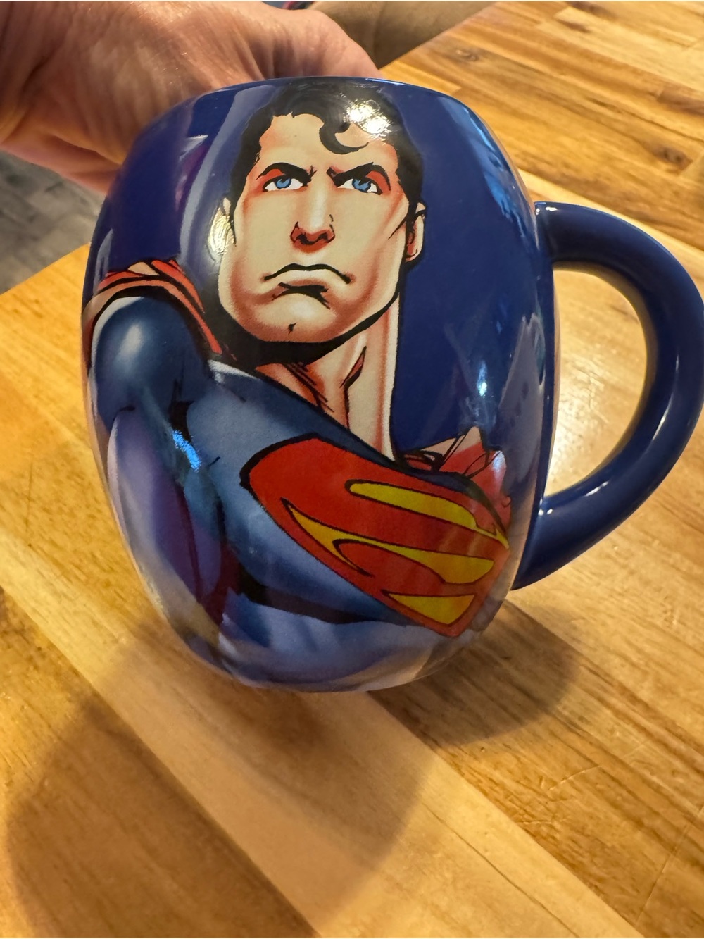 Blue Ceramic Superhero Logo Mug - Bold Graphic Design